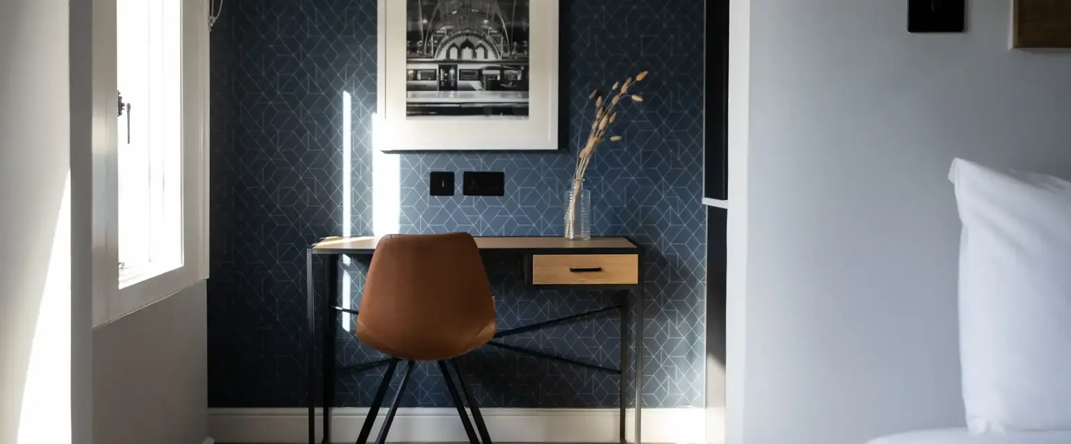 a desk and chair in a room