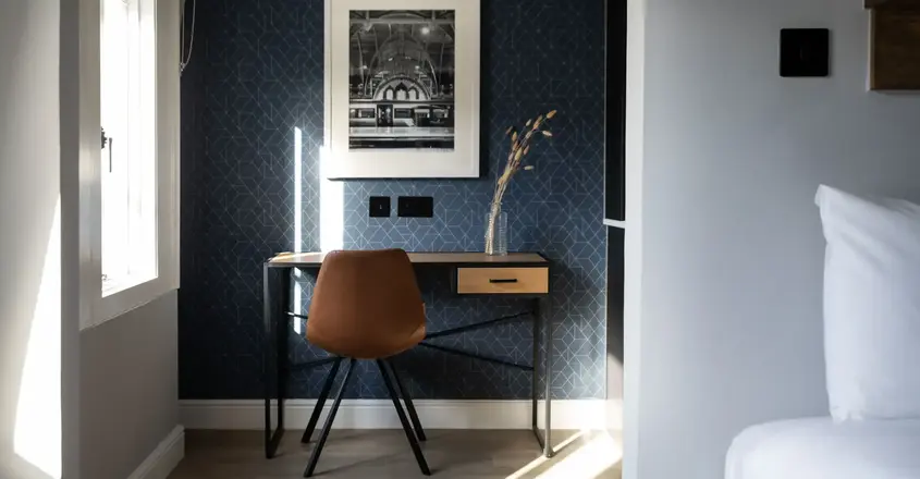 a desk and chair in a room