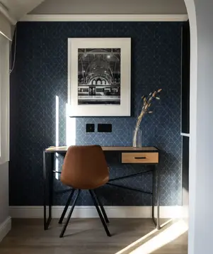 a desk and chair in a room