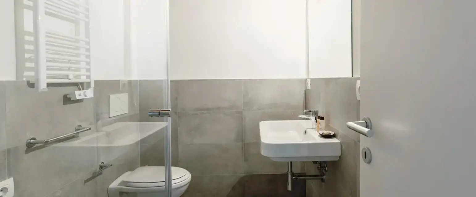 a bathroom with a sink and toilet