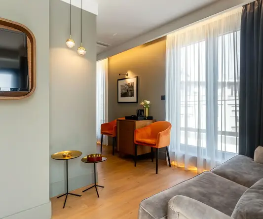 a living room with a couch and a table