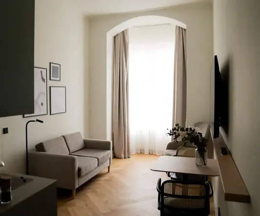 a living room with a tv and couch