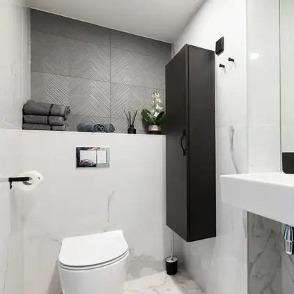 a bathroom with a sink and toilet