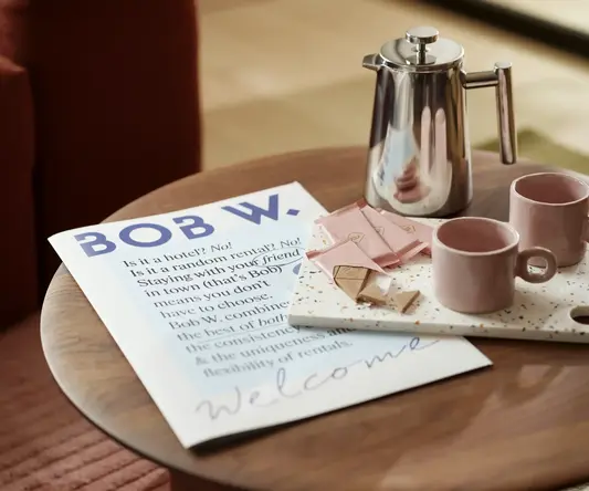 a coffee pot and a tray on a table