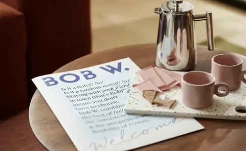 a coffee pot and a tray on a table
