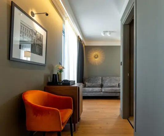 a room with a couch and a chair