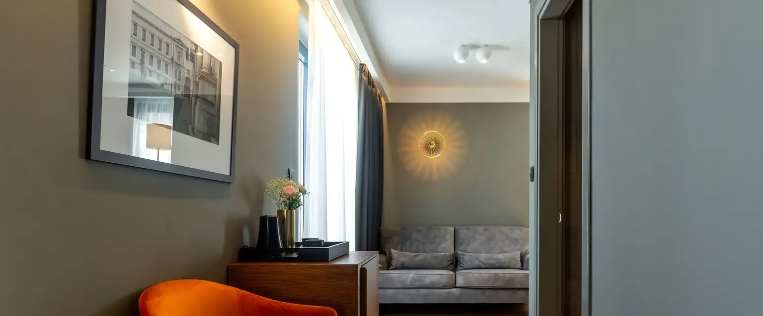 a room with a couch and a chair