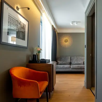 a room with a couch and a chair