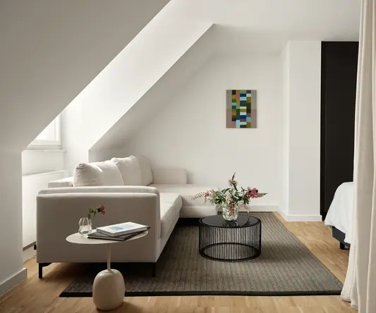 a living room with a couch and a coffee table