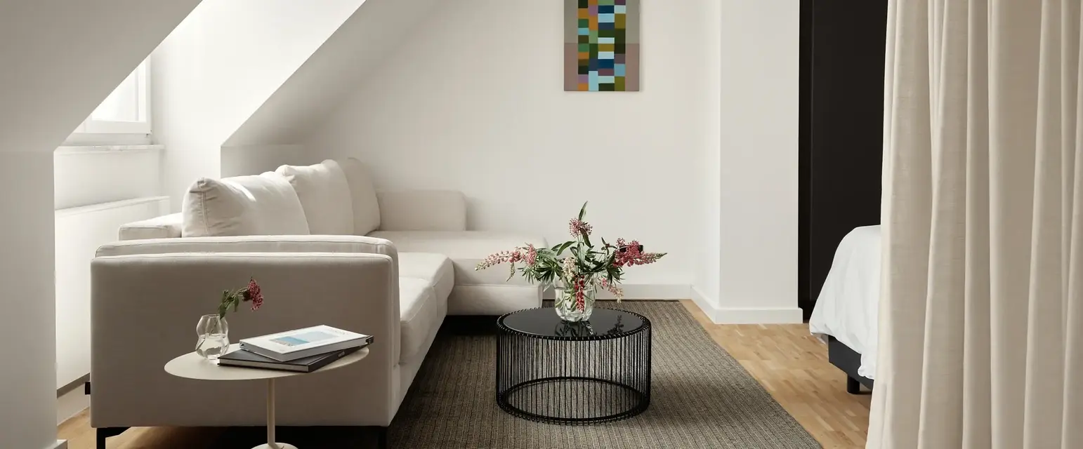 a living room with a couch and a coffee table