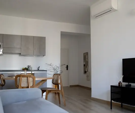 a living room with a couch and a table