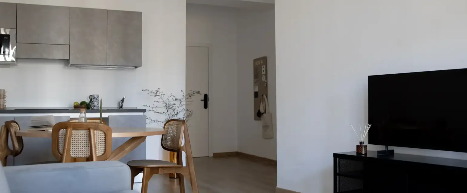 a living room with a couch and a table