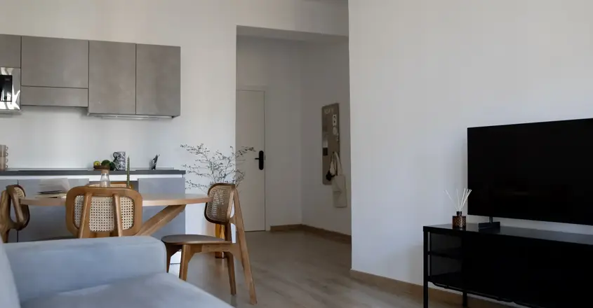 a living room with a couch and a table