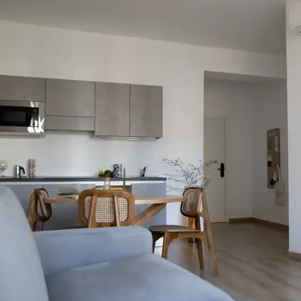 a living room with a couch and a table