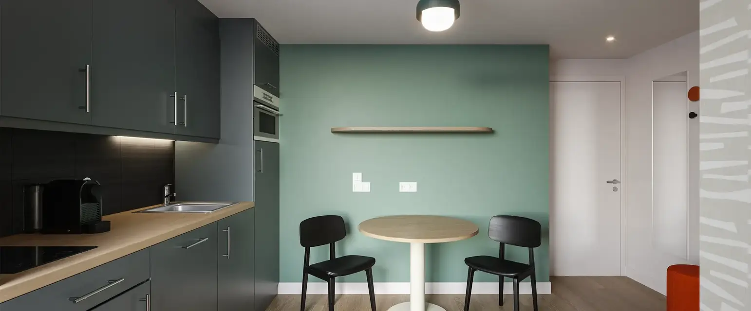 a table and chairs in a kitchen