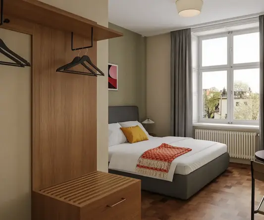 a bedroom with a bed and a table