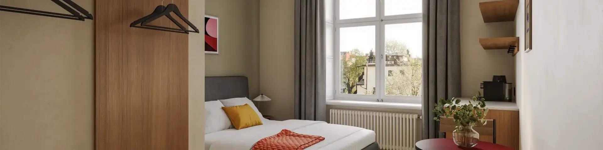 a bedroom with a bed and a table