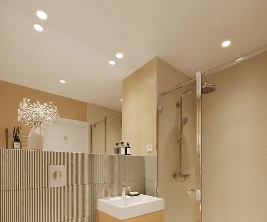 a bathroom with a shower and sink