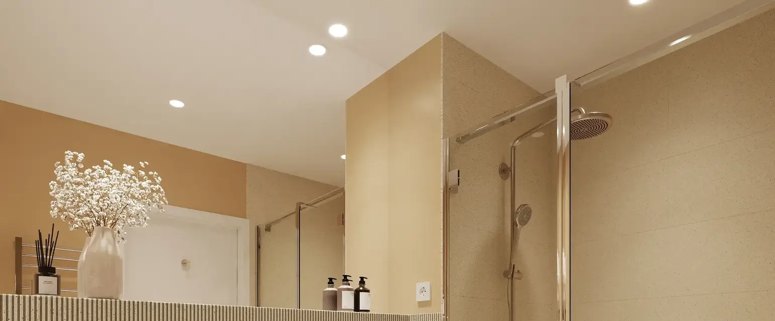 a bathroom with a shower and sink