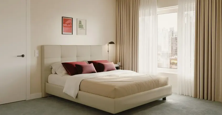 a bed with a lamp and a window
