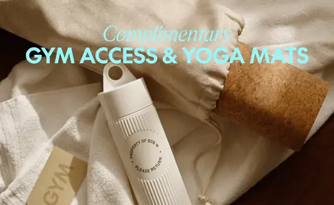 a white bottle on a towel