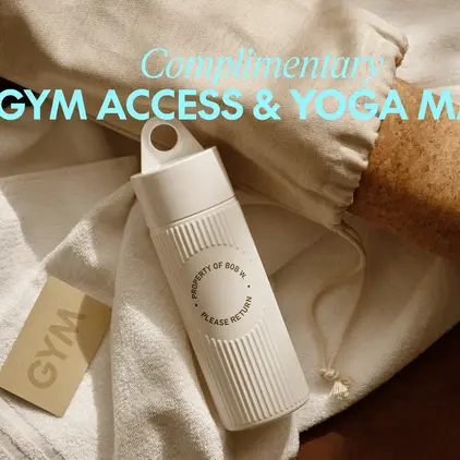 a white bottle on a towel