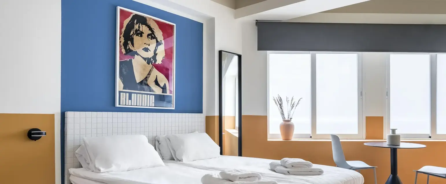 a bed with towels on it