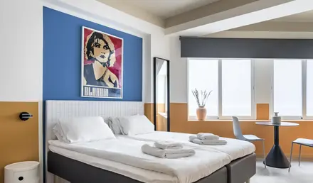 a bed with towels on it