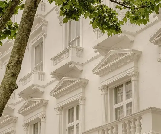 a white building with a sign on the front