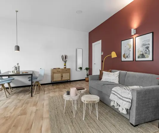 a living room with a couch and a table