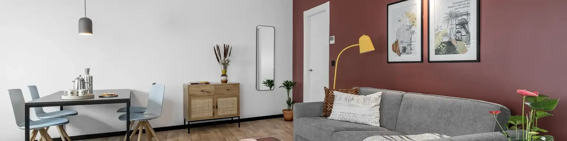 a living room with a couch and a table