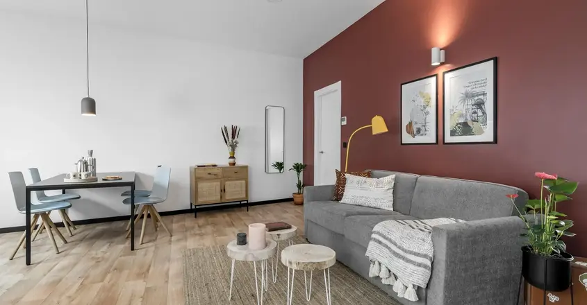 a living room with a couch and a table