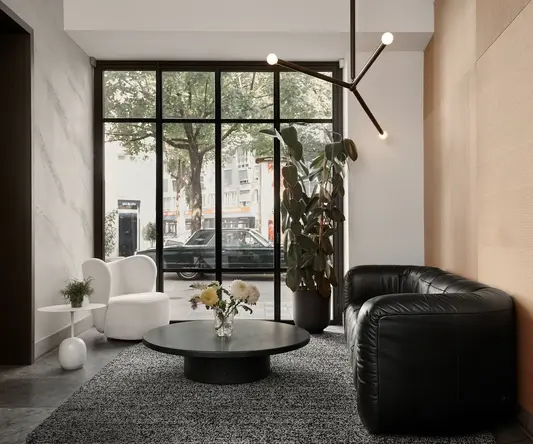 a room with a couch and a coffee table