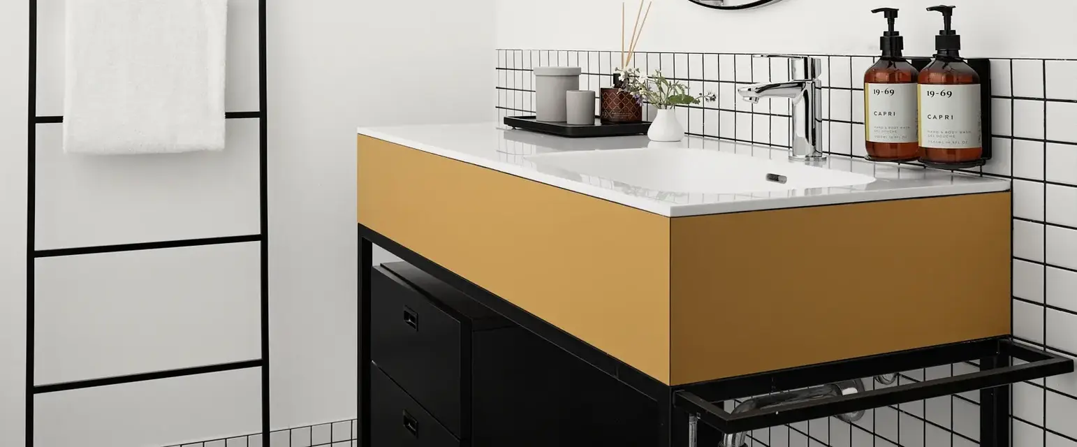 a bathroom with a mirror and sink