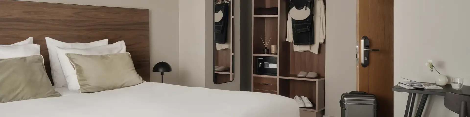 a bedroom with a bed and a closet