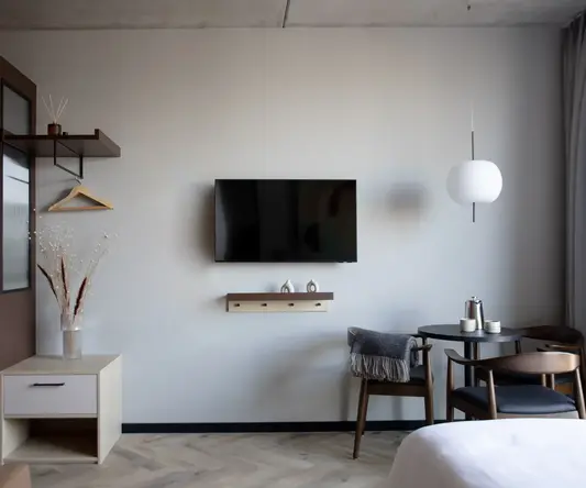 a room with a tv on the wall