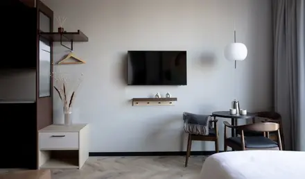a room with a tv on the wall