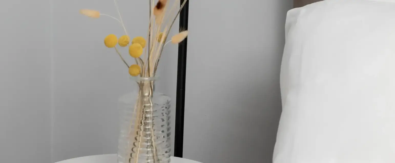 a lamp next to a table