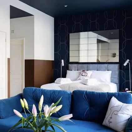 a blue couch in a room