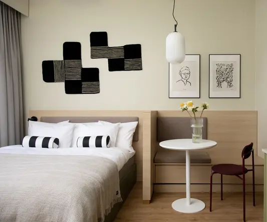 a room with a bed and a table