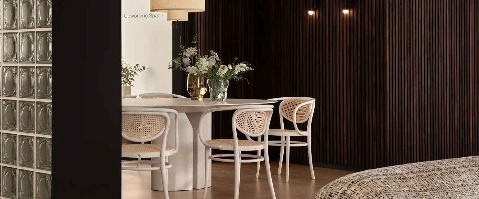 a room with a table and chairs