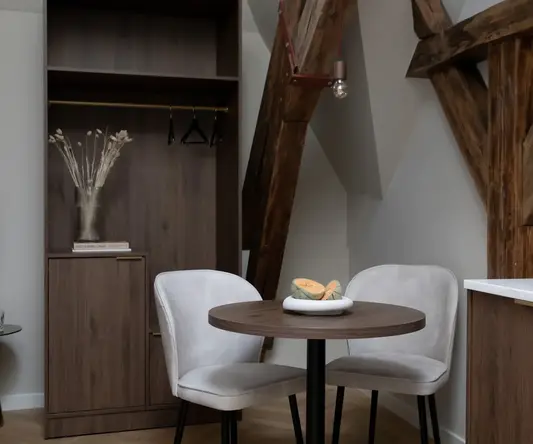 a table and chairs in a room