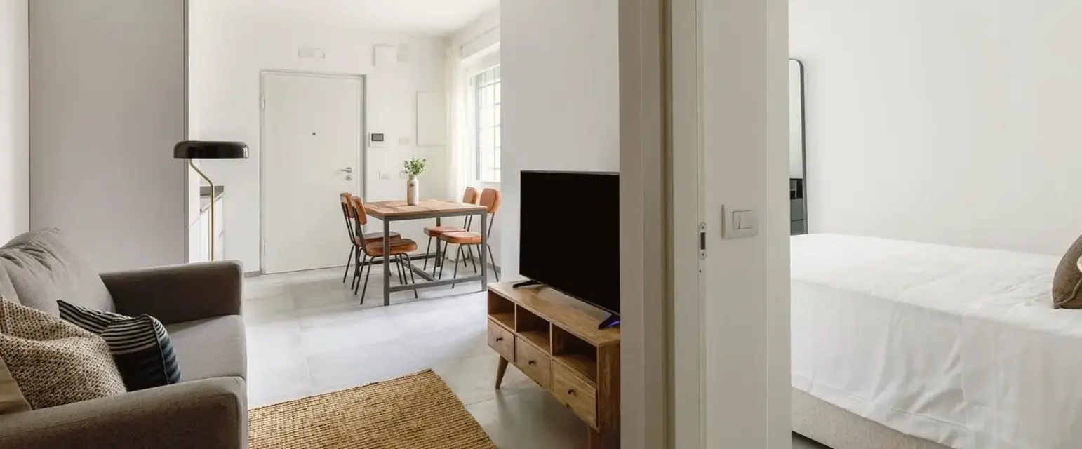 a living room with a tv and a table