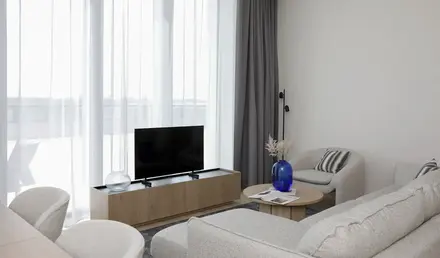 a living room with a tv and a couch