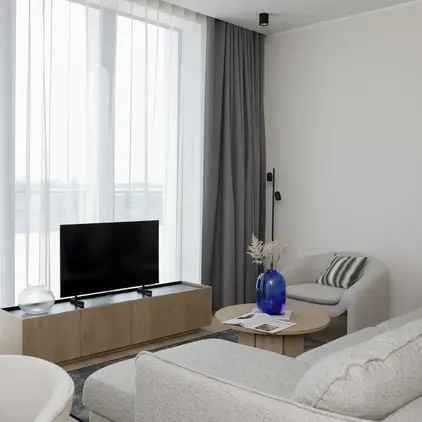 a living room with a tv and a couch