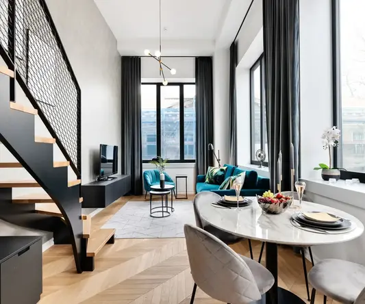 a room with a table and chairs