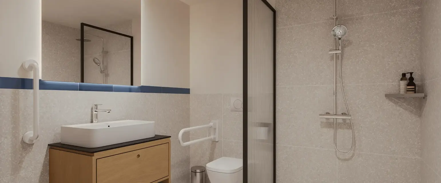 a bathroom with a shower and sink