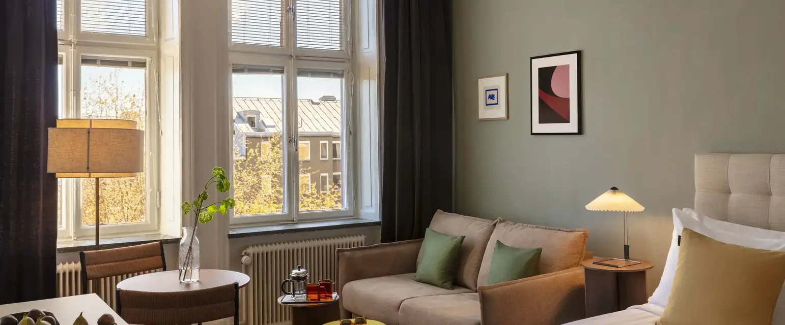 a room with a couch and a bed