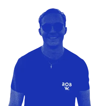 a man wearing sunglasses and a blue shirt