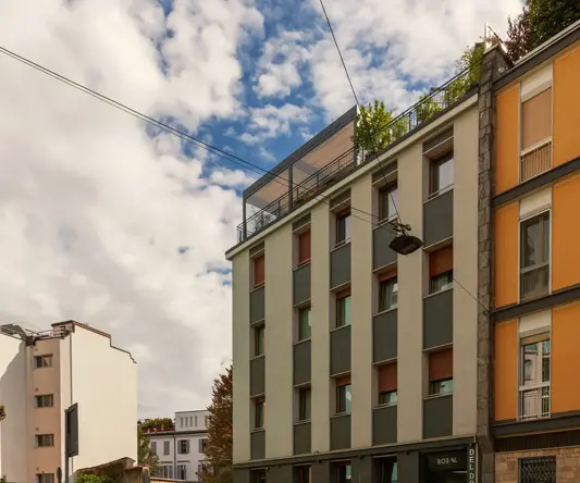 a building with plants on top of it